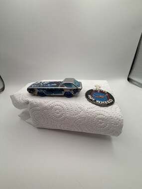 Hot Wheels Deora I Police Riptide Rescue Vehicle with Collector Button